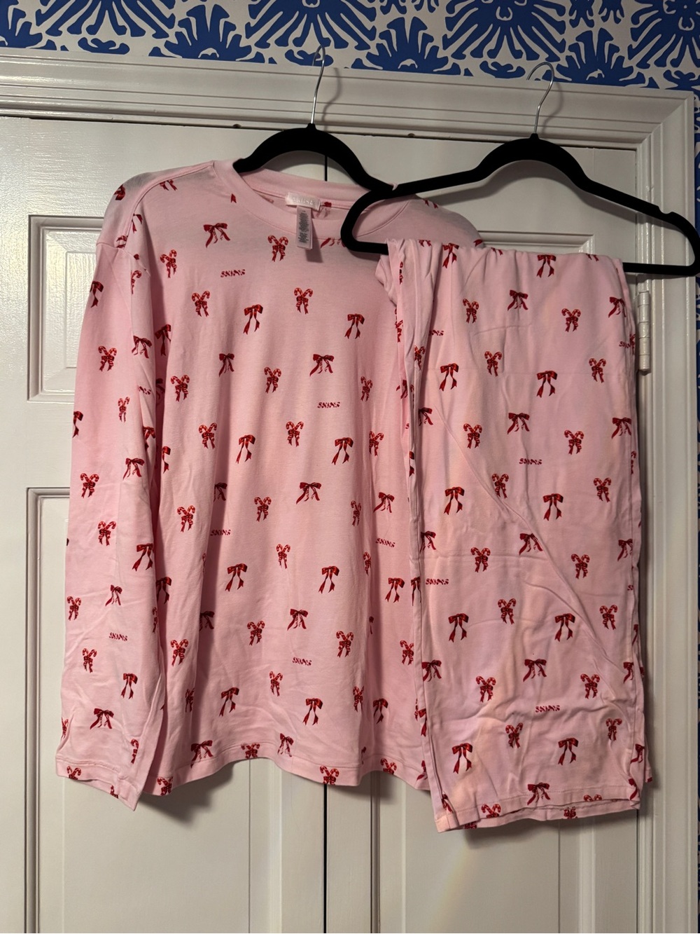 SKIMS Pink Long-Sleeve Pajama Set with Red Bow Print